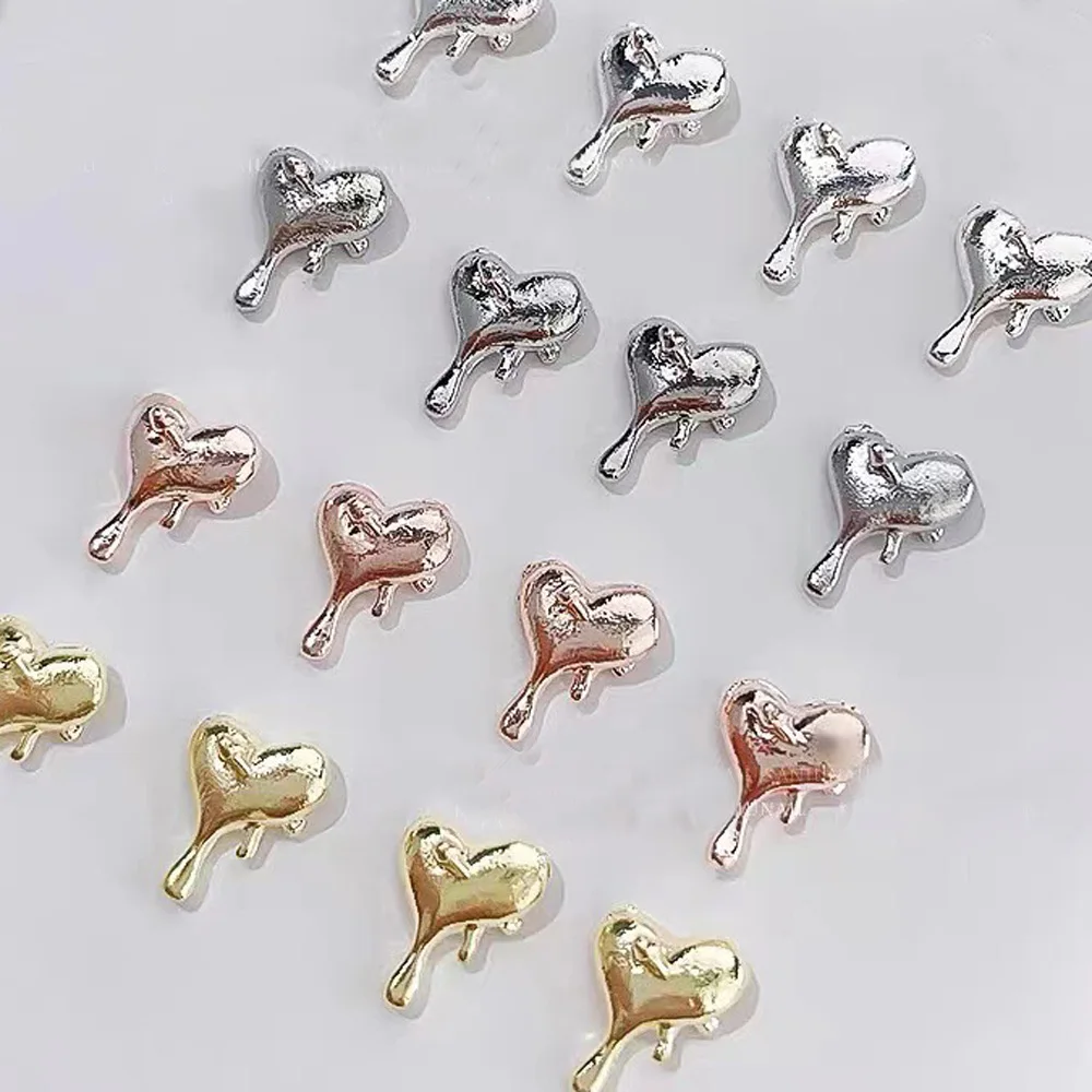 10 pezzi Lava a forma di cuore Nail Art Charms 3D metallo oro argento Liquid Flow Love Nail Jewelry Girl Fashion accessori per unghie fai da te