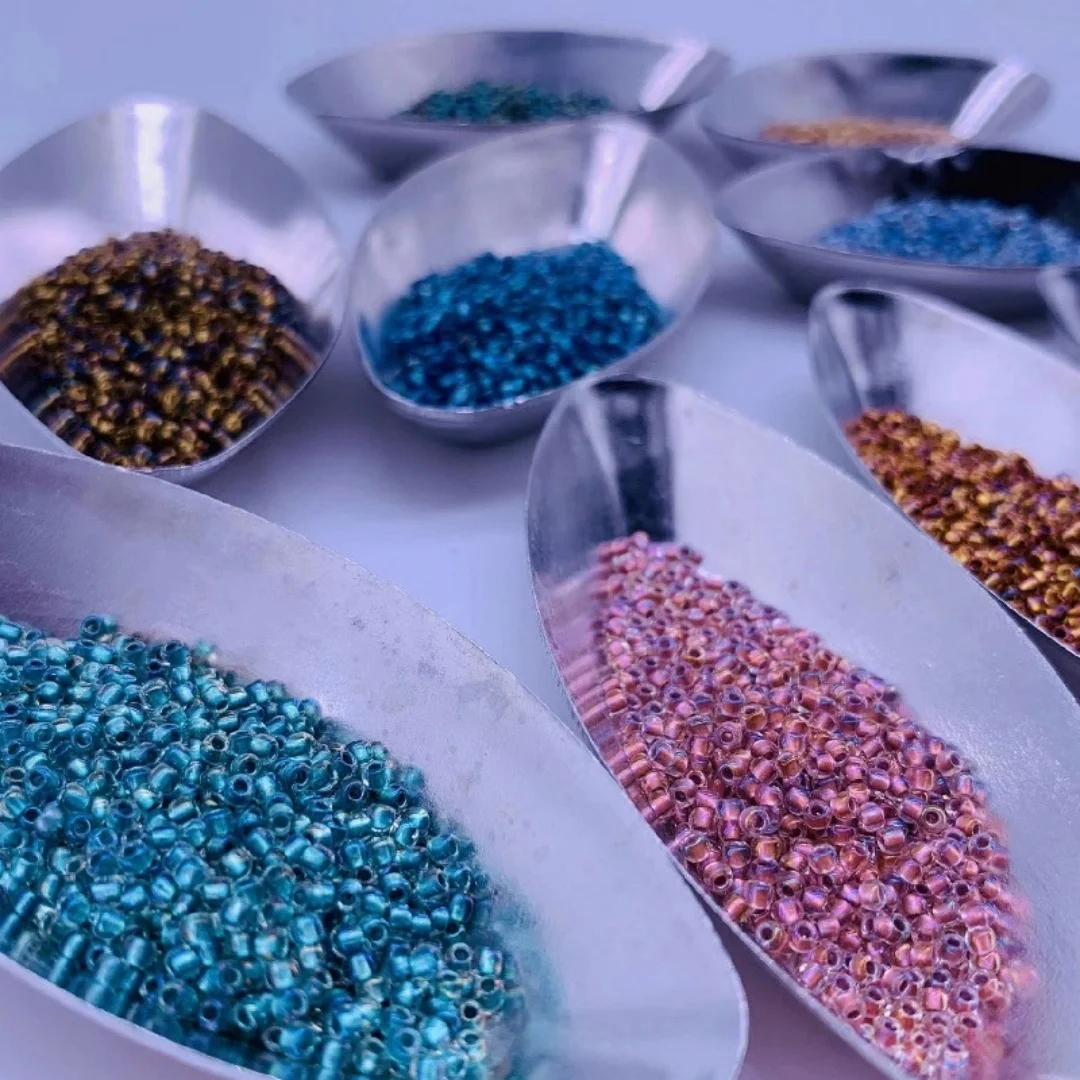 Dongbao 11/0 transparent iridescent bead core metal color, glass rice bead 2mm TOHO dye core glass bead DIY jewelry bead