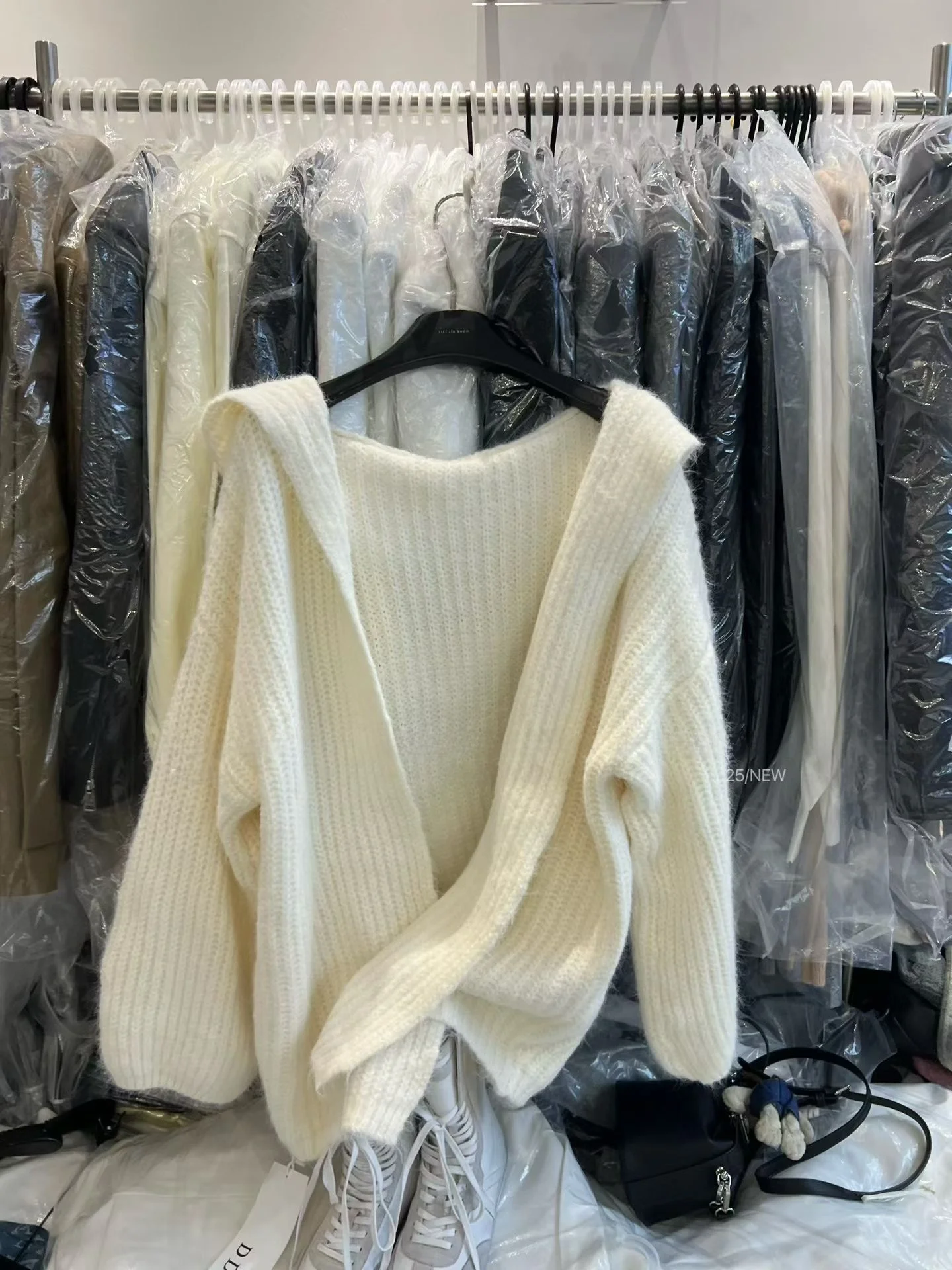 ゆったりとした女性のニット帽子セーターカジュアルスリーブロングスリーブコットンコートファッショナブルな秋冬オープンカーディガンレイジースリーブトップ