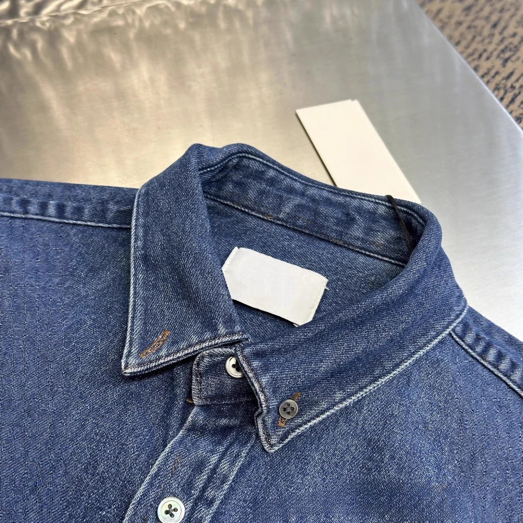 نسخة عالية 2026 قميص دينيم جديد سترة متعددة الاستخدامات الأوروبية والأمريكية أنماط مصمم فضفاضة غير رسمية للرجال والنساء