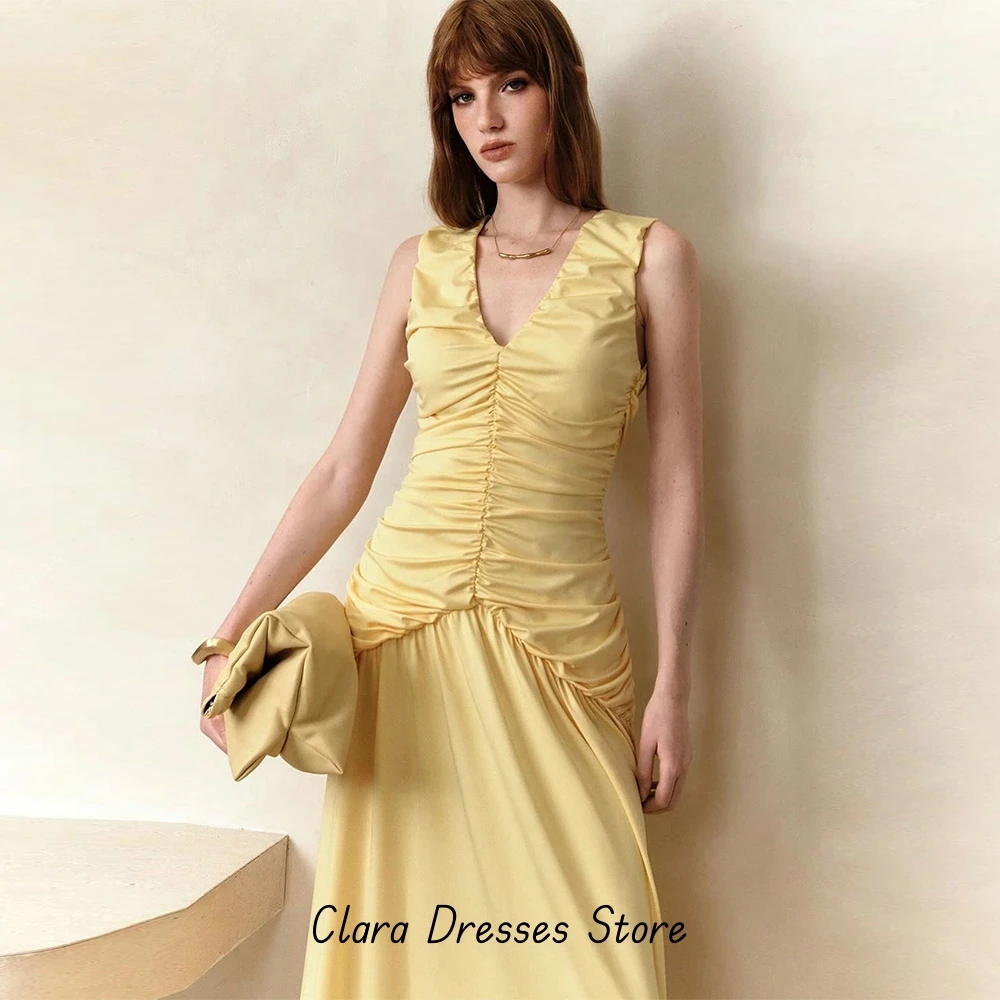 Ärmelloses Abendkleid mit V-Ausschnitt und A-Linie, maßgeschneidertes, modernes, bodenlanges Partykleid aus Jersey, temperamentvolles gelbes Promi-Kleid