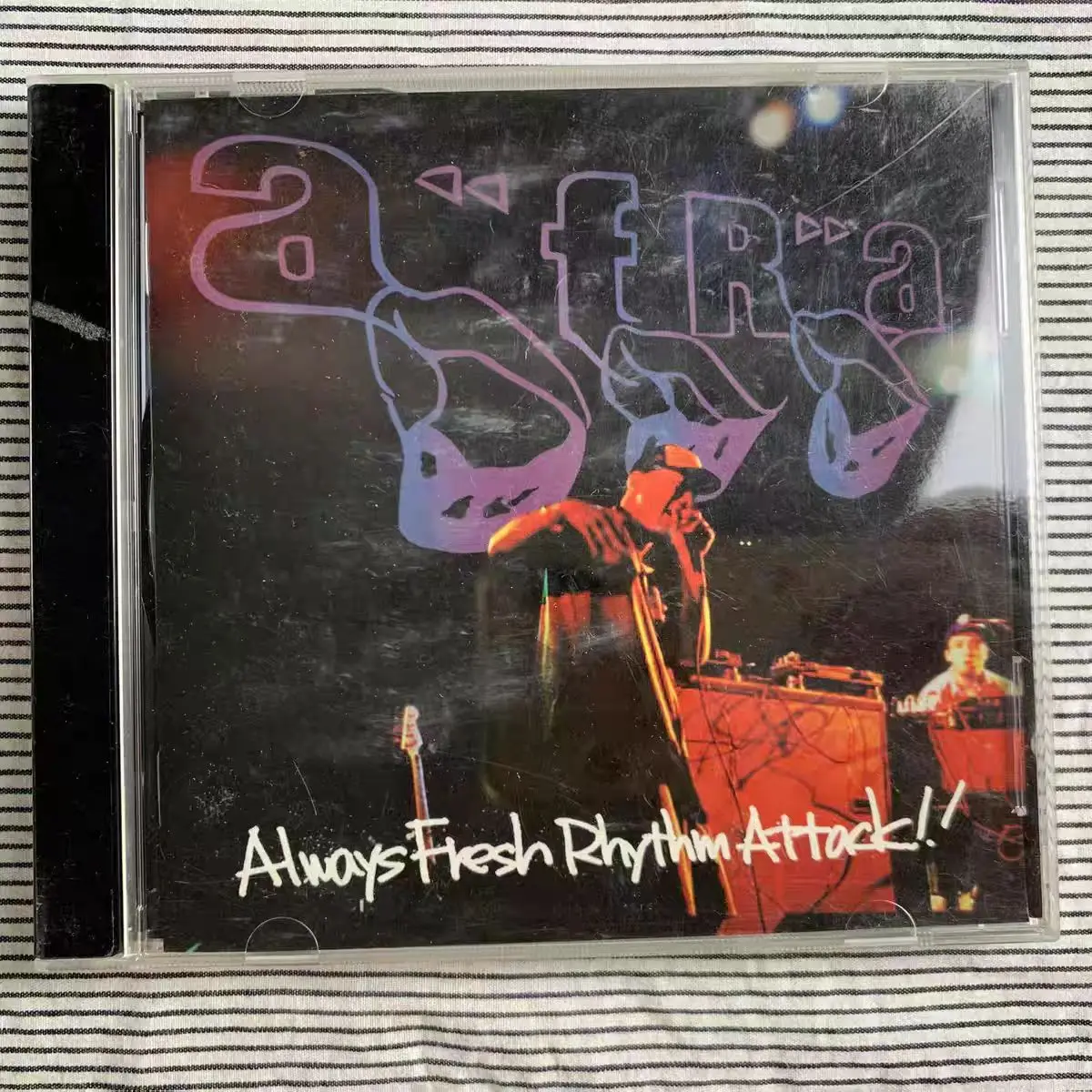 

CD Afra – Завжди свежая атака ритма!! , 1-й студийный альбом, японский битбокс/хип-хоп, 14 треков, ноябрь 3, 2003 г.