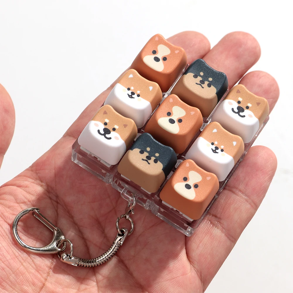 Neue 9-Tasten-Hunde-Finger-Tastatur ohne Beleuchtung, Stressabbau-Fidget-Schlüsselanhänger, Zeitvertreib-Tastenknopf, Quetschspielzeug für Erwachsene – Detail 8