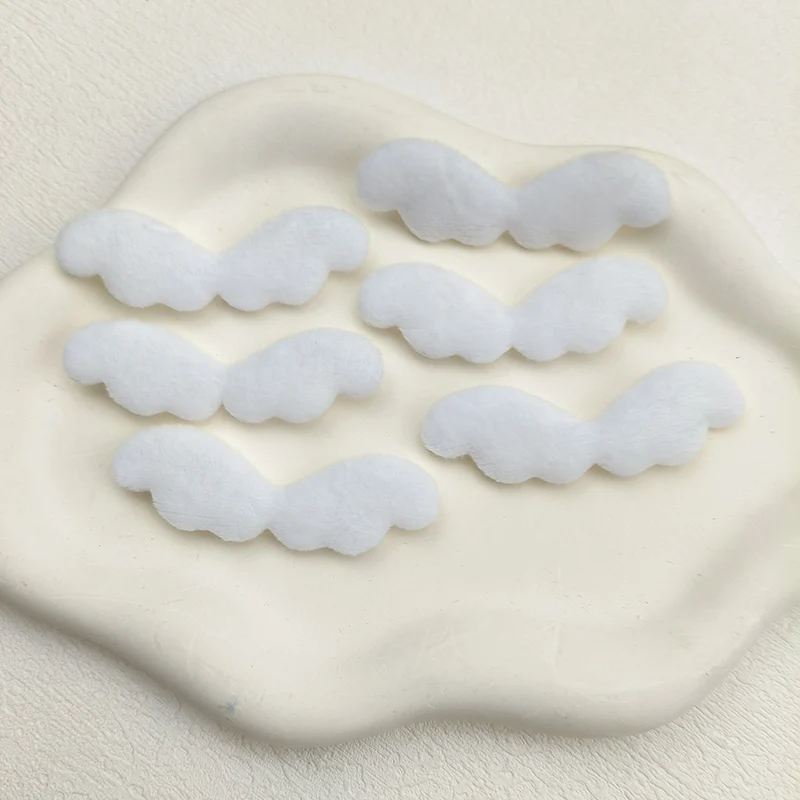 40 Stück gefütterte Filz-Applikationen in Form von Engelsflügeln, 6 x 2 cm, einseitig, für Kinderhüte, zum Selbernähen, für Haarband- und Haarspangen-Accessoires. – Detail 1