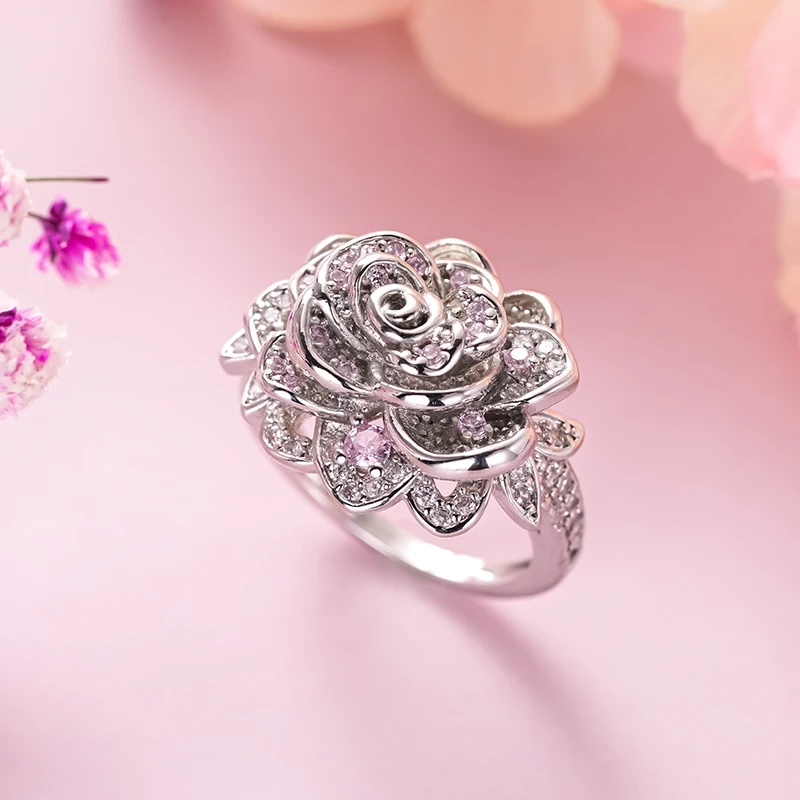 Huitan Damenring in Blumenform, silberfarben, ästhetisches Design, Hochzeit, Verlobung, elegant, mit glänzendem rosa CZ-Accessoires-Schmuck