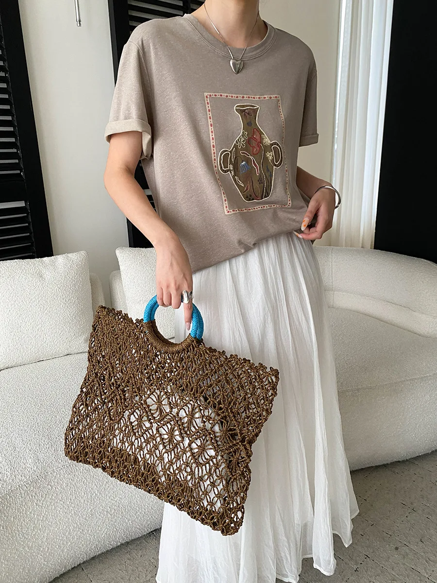 Sommerliches Damen-T-Shirt in einfarbigem Retro-Stil mit Vase-Stickerei, Rundhalsausschnitt, lockerer, schlank machender, vielseitiger Schnitt und kurzen Ärmeln. – Detail 8