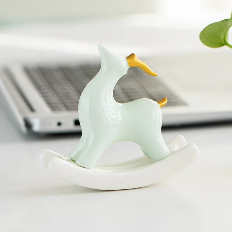 Creative cute rocking deer ceramic ornaments, modern minimalist decorations, fun tea pet pen holders, home desktop furnishings