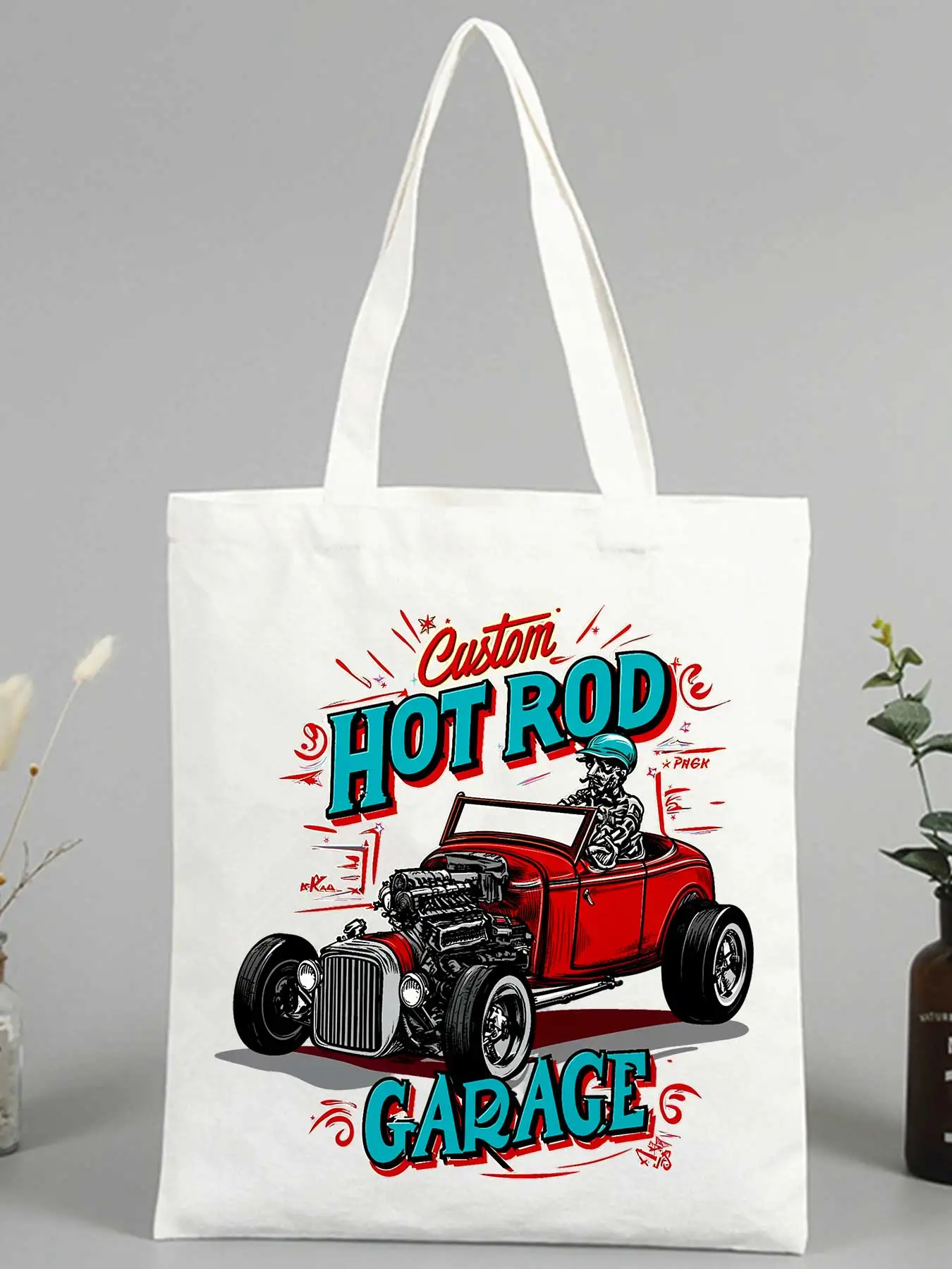Women's canvas tote bag with vintage hot rod and skeleton graphic, retro style for casual shopping and daily use