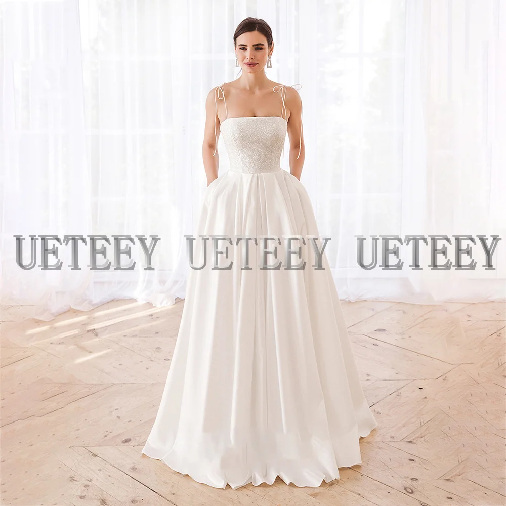 Ueteey elegant a-line vestido de casamento cinta de espaguete sem mangas rendas até atrás varredura trem vestidos de noiva starpless 2022