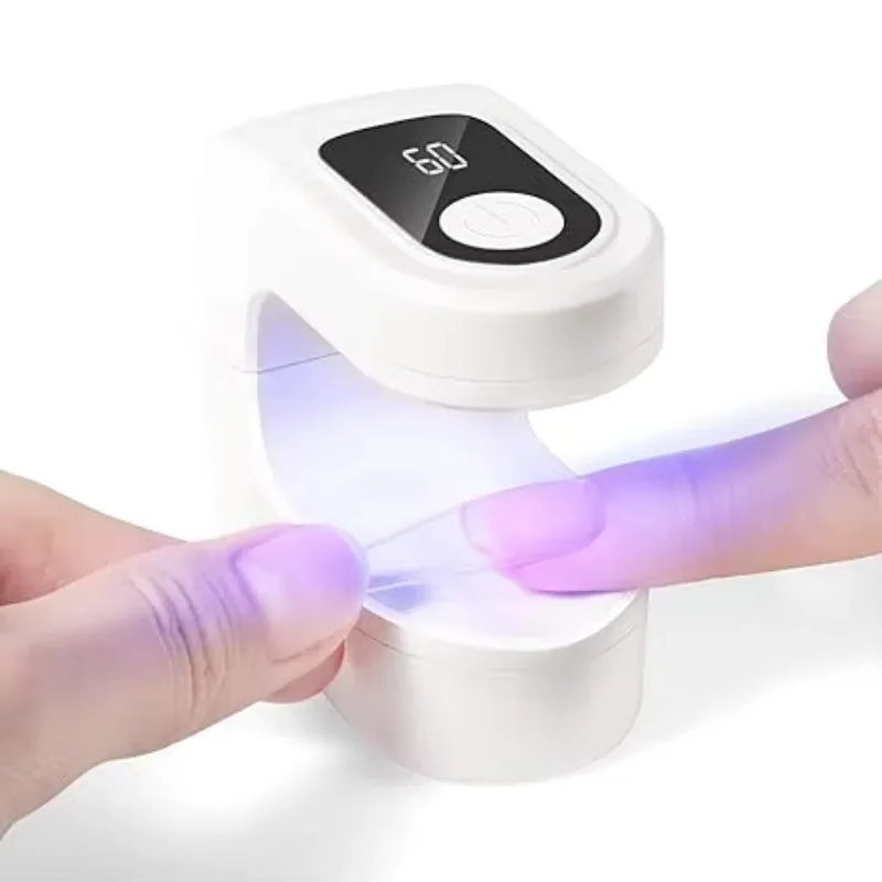 Mini UV manicure lamp that cures in just 10 seconds, with UV display and two timers.