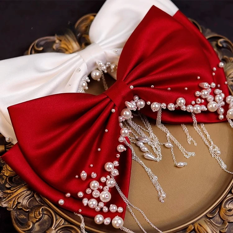 Français cousu à la main perle Satin exquis arc épingle à cheveux robe de mariée robe de mariée robe de grillage accessoires de robe