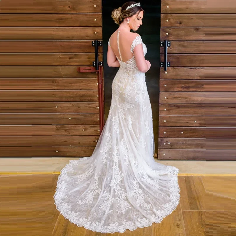 Aangepaste off-the-shoulder kanten appliqué zeemeermin trouwjurk sweep trein illusie knoppen vestidos de novia strand bruidsjurk