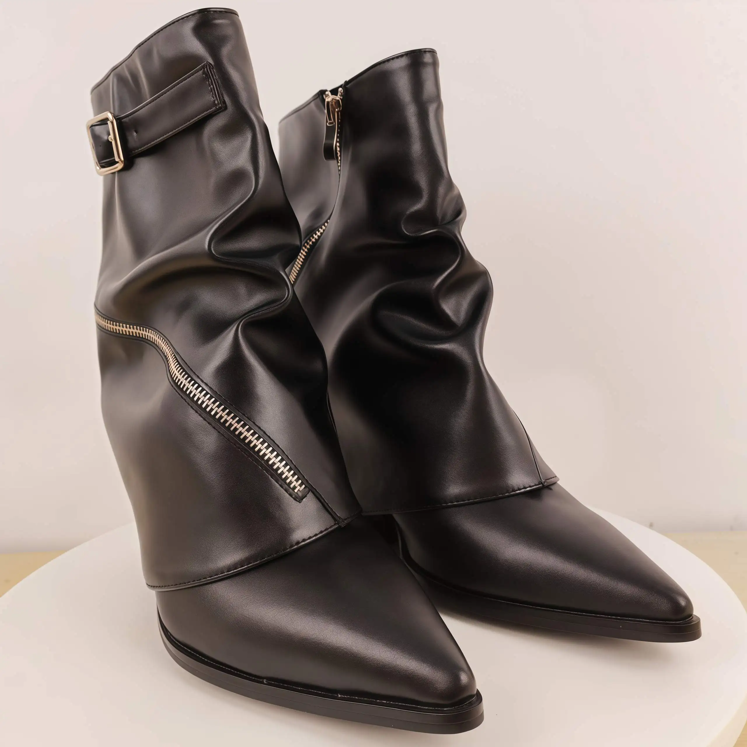 

Women's Black Leather Slouchy Ankle Boots Pointed Wedge Boots with Asymmetric Zipper Buckle Detail Avant Garde Edgy Footwear