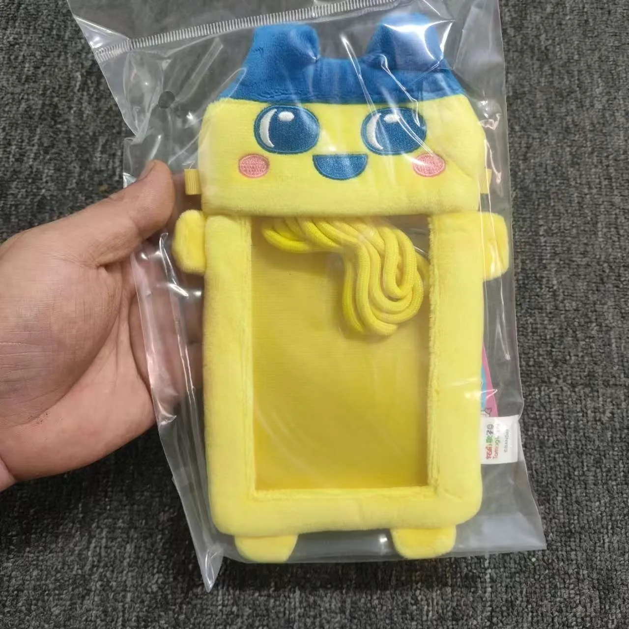 ของแท้จาก Bandai ทามาก็อตจิ โออุจิ โออมิมิ ตุ๊กตาขนนุ่มน่ารัก ของเล่นอิเล็กทรอนิกส์รูปแบบสัตว์เลี้ยง พร้อมกระเป๋าเก็บของแบบเครื่องเล่น  กระเป๋าใส่หูฟัง ของขวัญ