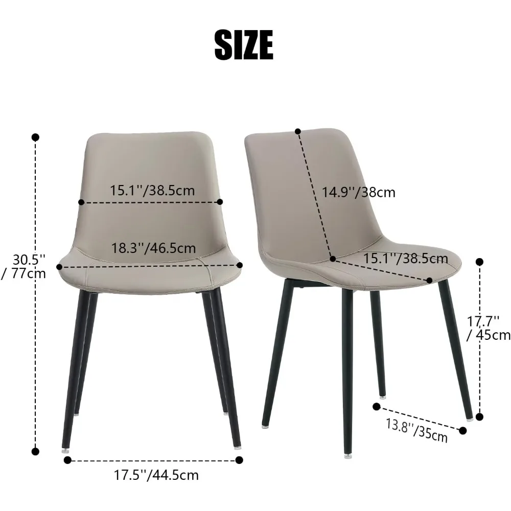 paar moderne kunstleren eetkamerstoelen uit het midden van de eeuw voor comfortabele keukenzitplaatsen