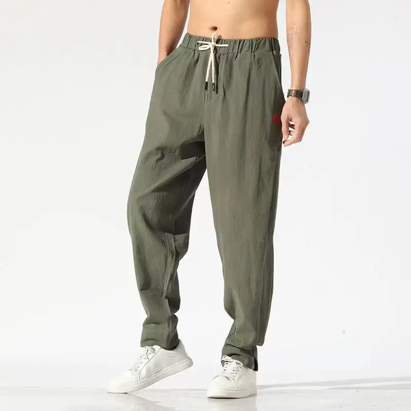 2023 Cotton Flax Men's Clothing Fashion Casual Trend Loose Solid Color Elastic High Waist Spliced Drawstring Refreshing Trousers