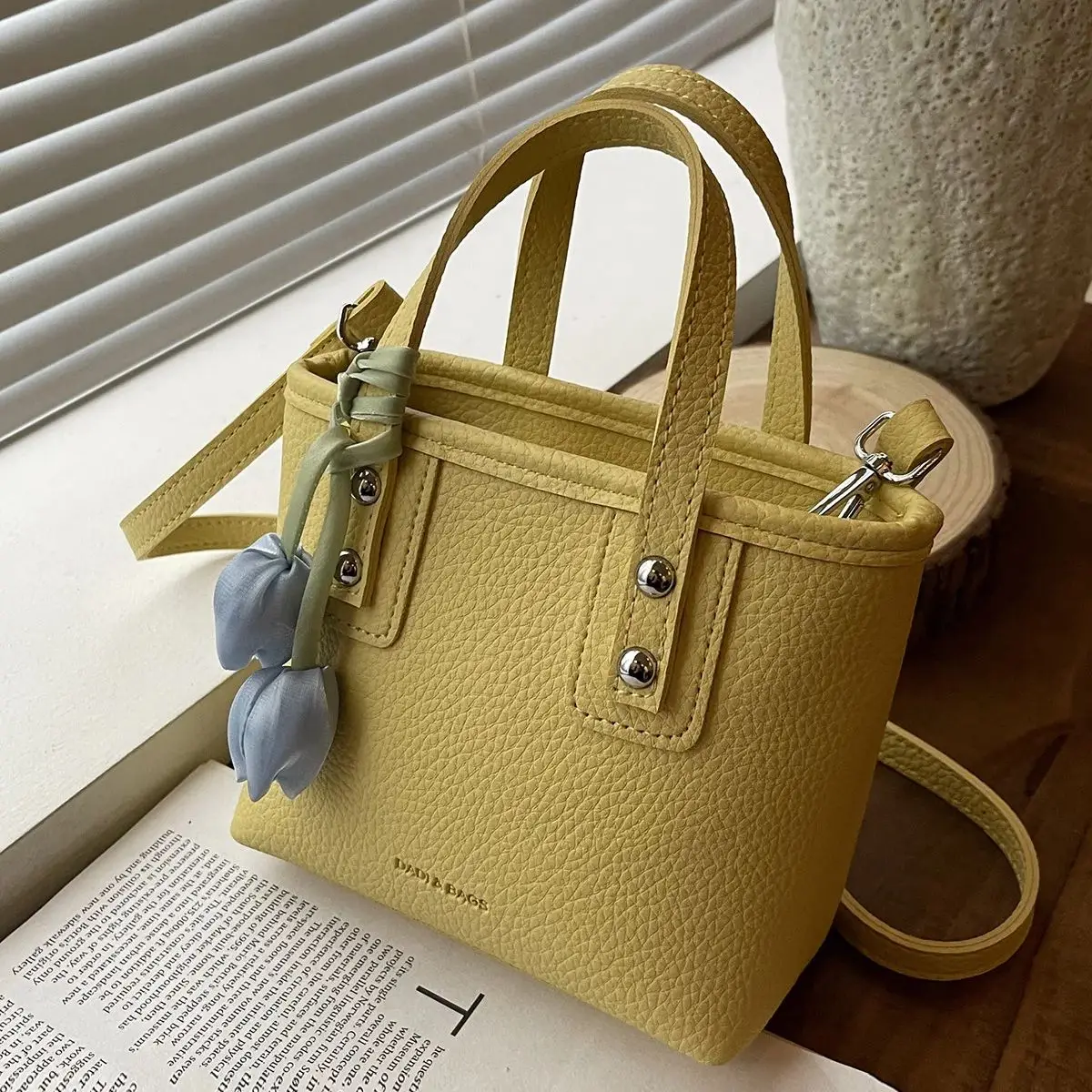 

Texture PU handbag With Flower Pendant Korean Version Solid Color Versatile Crossbody Bag Fashion Hot Sale Water Bucket Bag