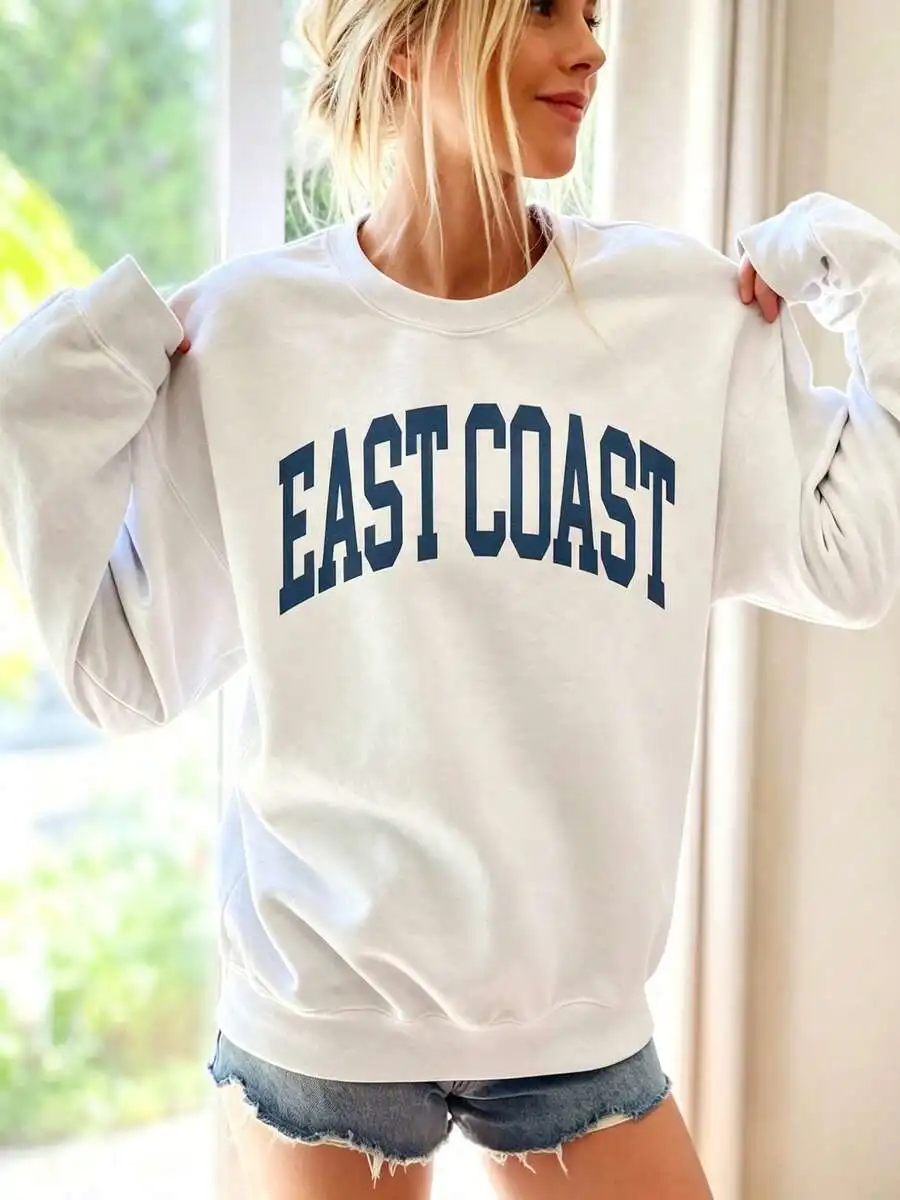 Sudadera de cuello redondo con estampado de letras EAST COAST para mujer, colección otoño-invierno 2026, estilo vintage holgado, jersey universitario retro, ropa urbana de estilo universitario.