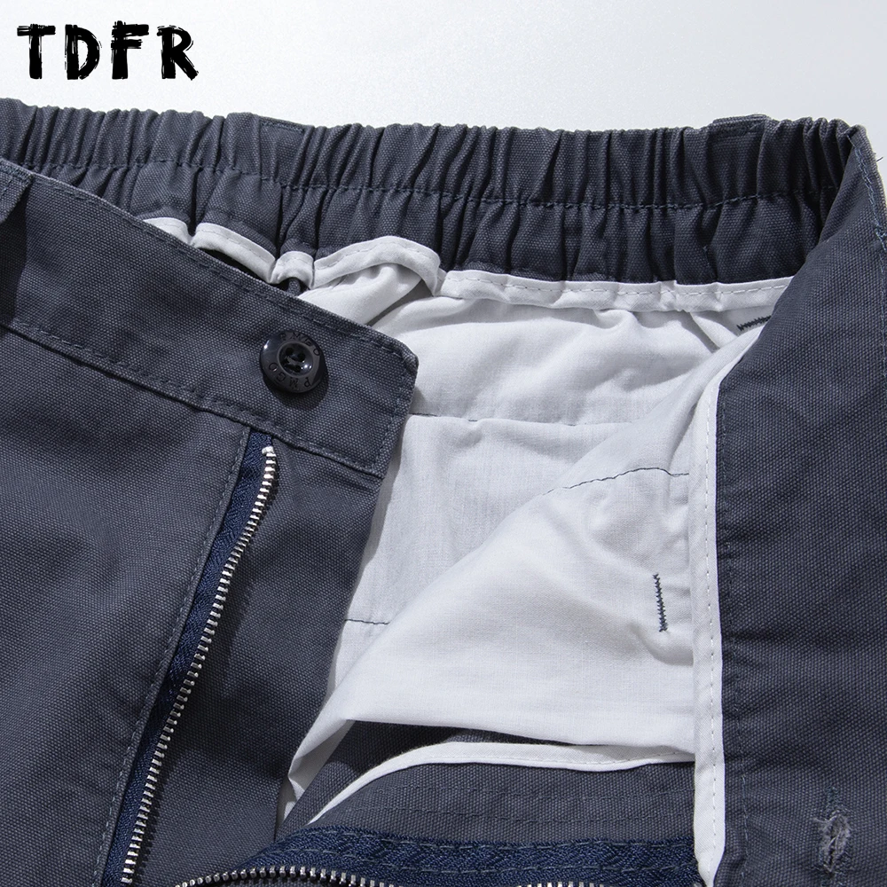 Multi-Pocket Pleated Cargo Pants Mens Spliced Solid Color  Safari Style Retro Baggy Wide Leg Elastic Waist Trousers Man