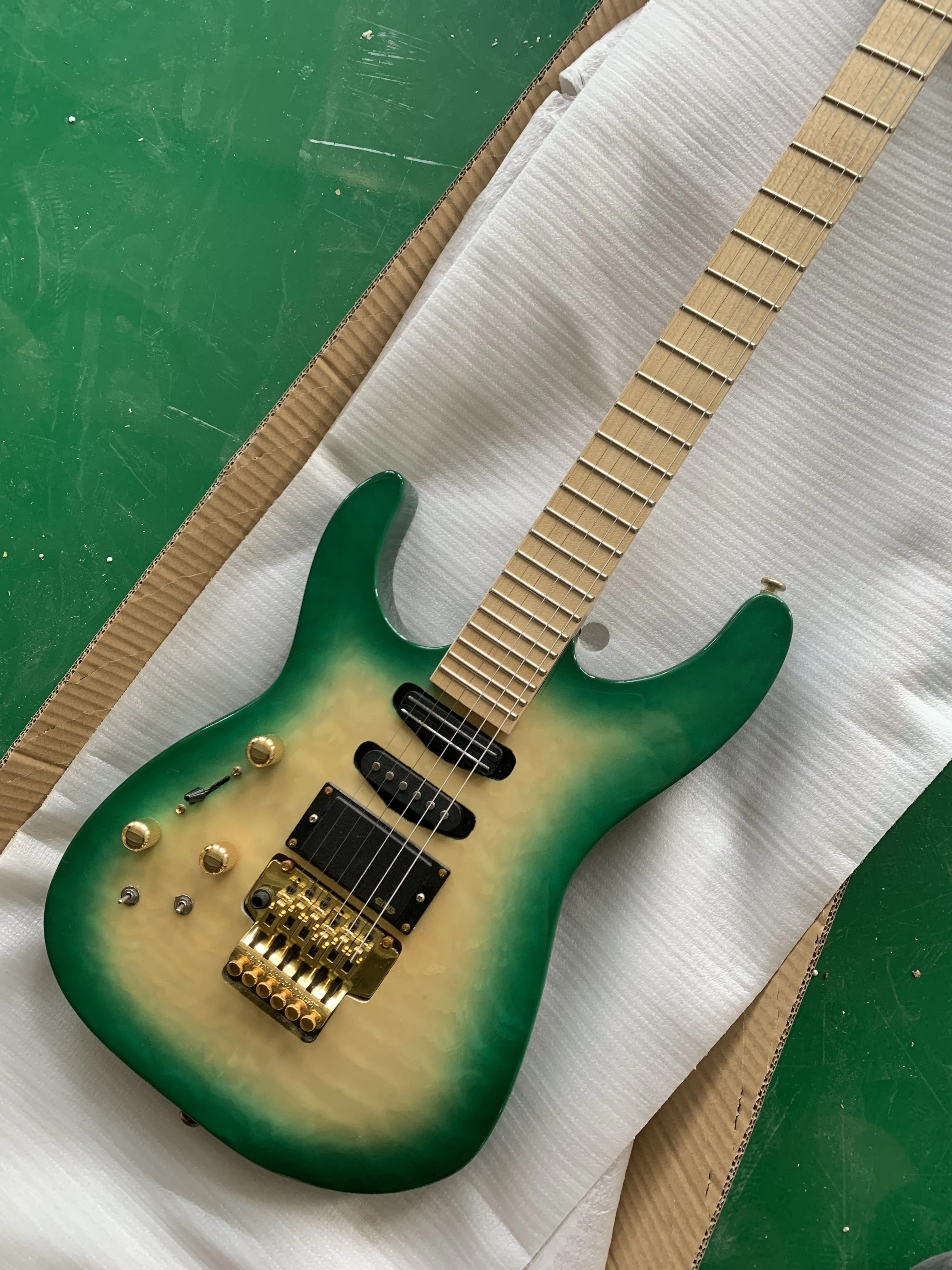 Left hand Jackson Guitar, clear flower with green edge, double rocker active pickup, gold accessories, free shipping (016)