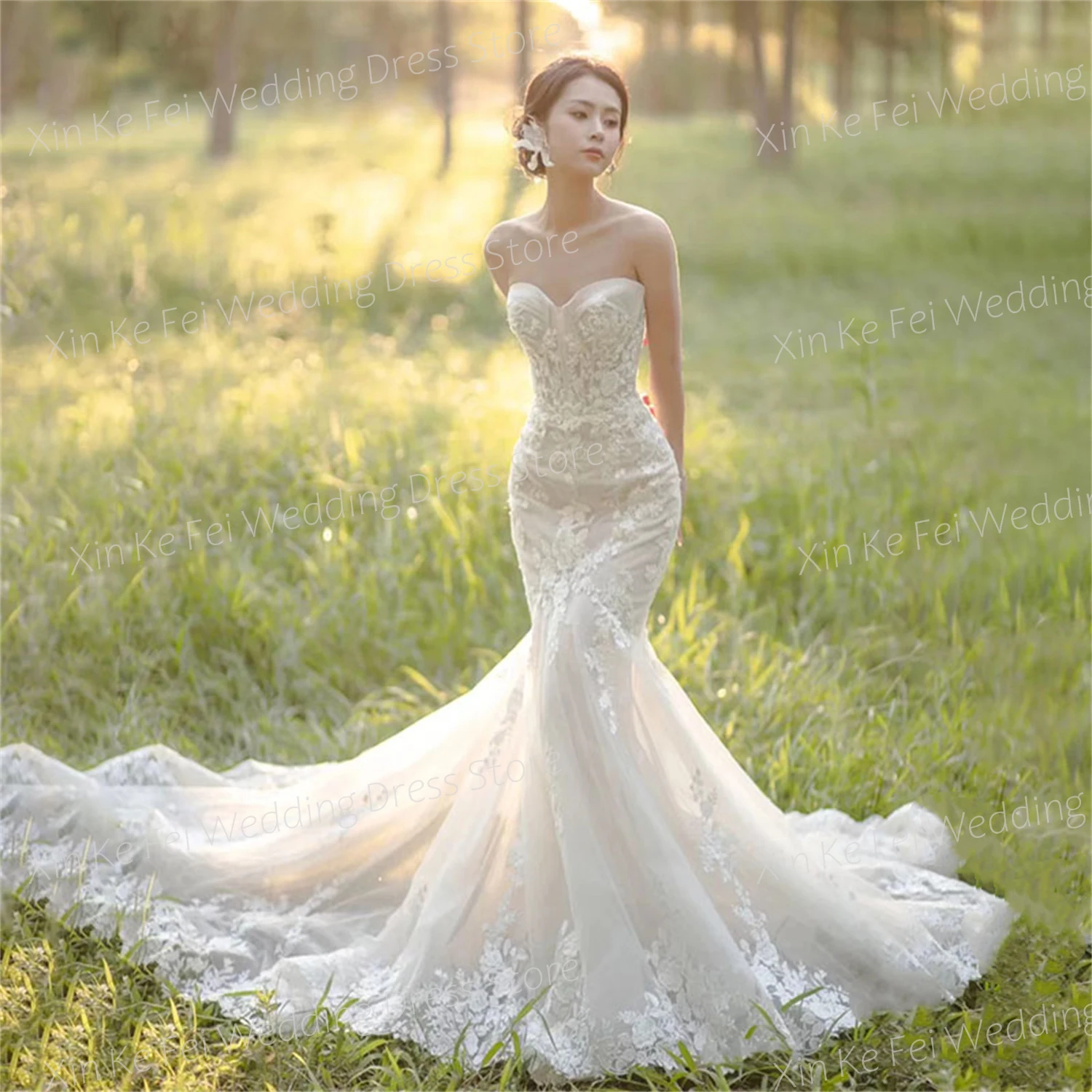 Beautiful Modern Wedding Dresses Sexy Strapless Bride Gowns Brush Train New Exquisite Mermaid Lace Appliques Sleeveless Backless