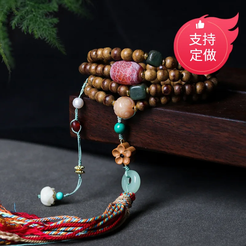 First-line yellow butterwood agarwood bracelet handcrafted with small sandalwood flowers and tassels a women's jewelry piece