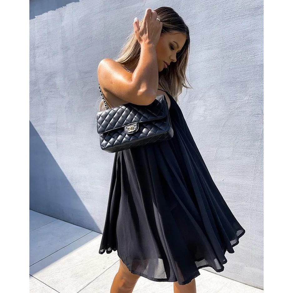 女性春夏の新セクシーなシフォンドレス女性のルーズカジュアル背中の開いたストラップドレス V ネックセクシーなソリッドカラーミニ