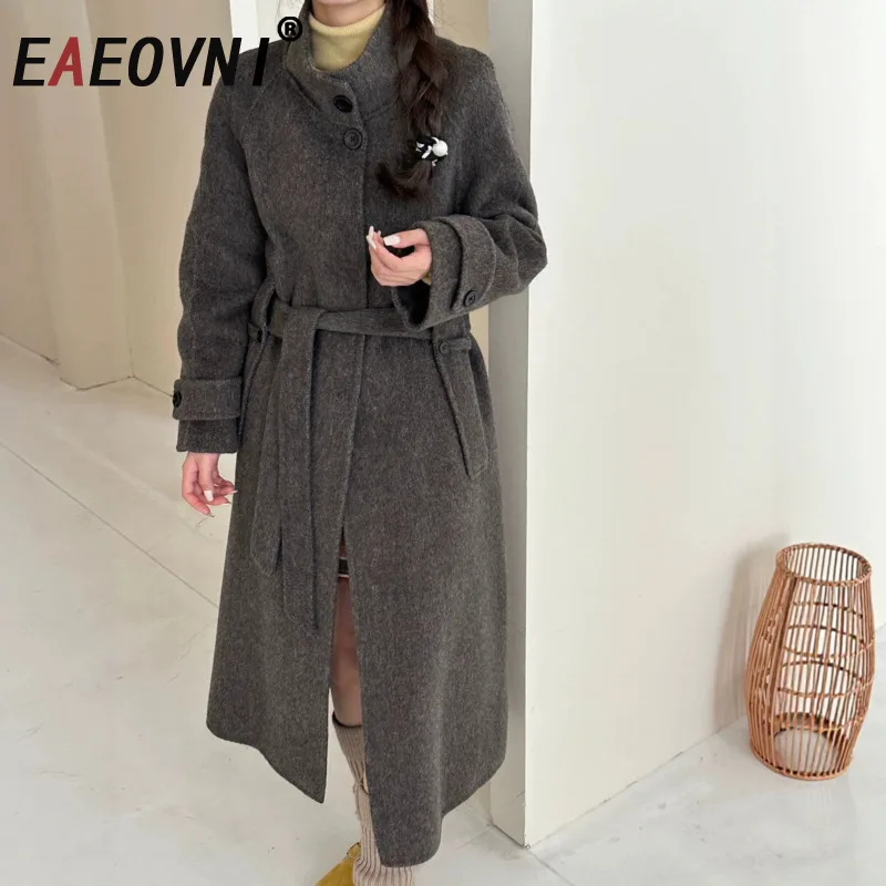 

EAEOVNI Double Wool Long Women's Coat Solid Color Fashion Stand Collar Belt Button Temperament Jacket 2025 Autumn Winter New