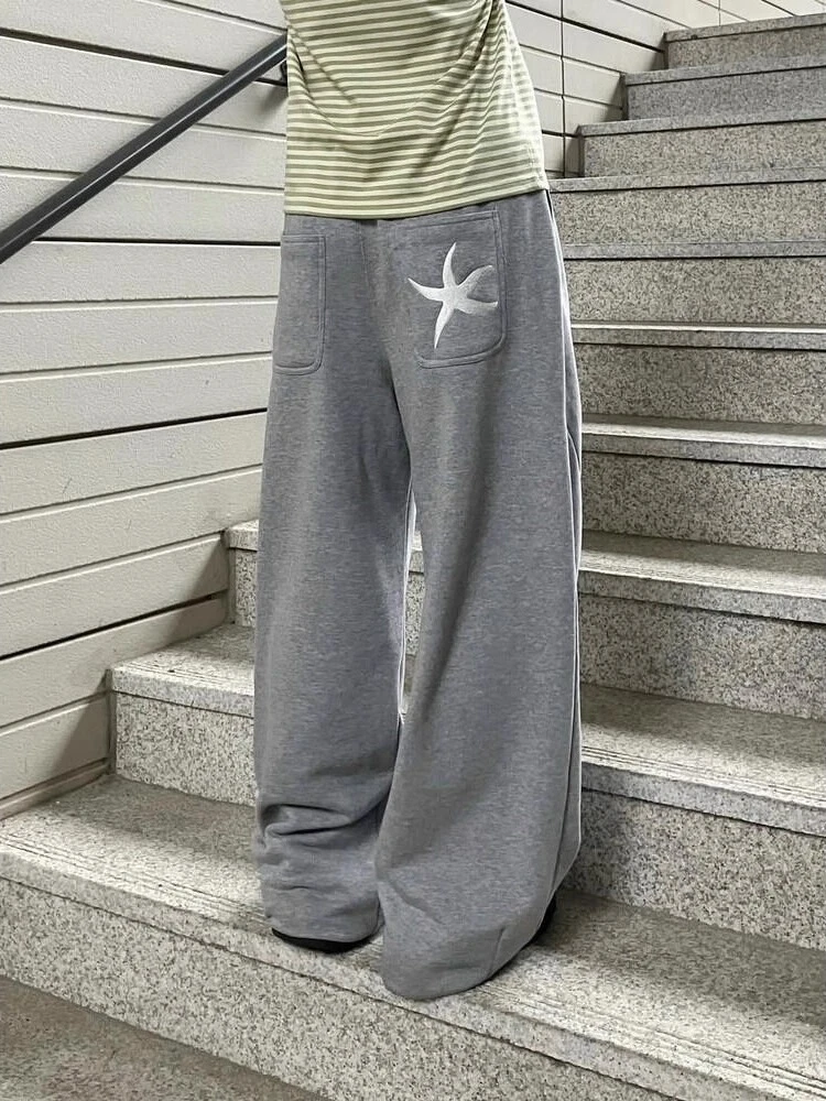 

Американские женские брюки в стиле High Street: свободные, широкие, в пол, с карманами, вышивкой и эффектом драпировки