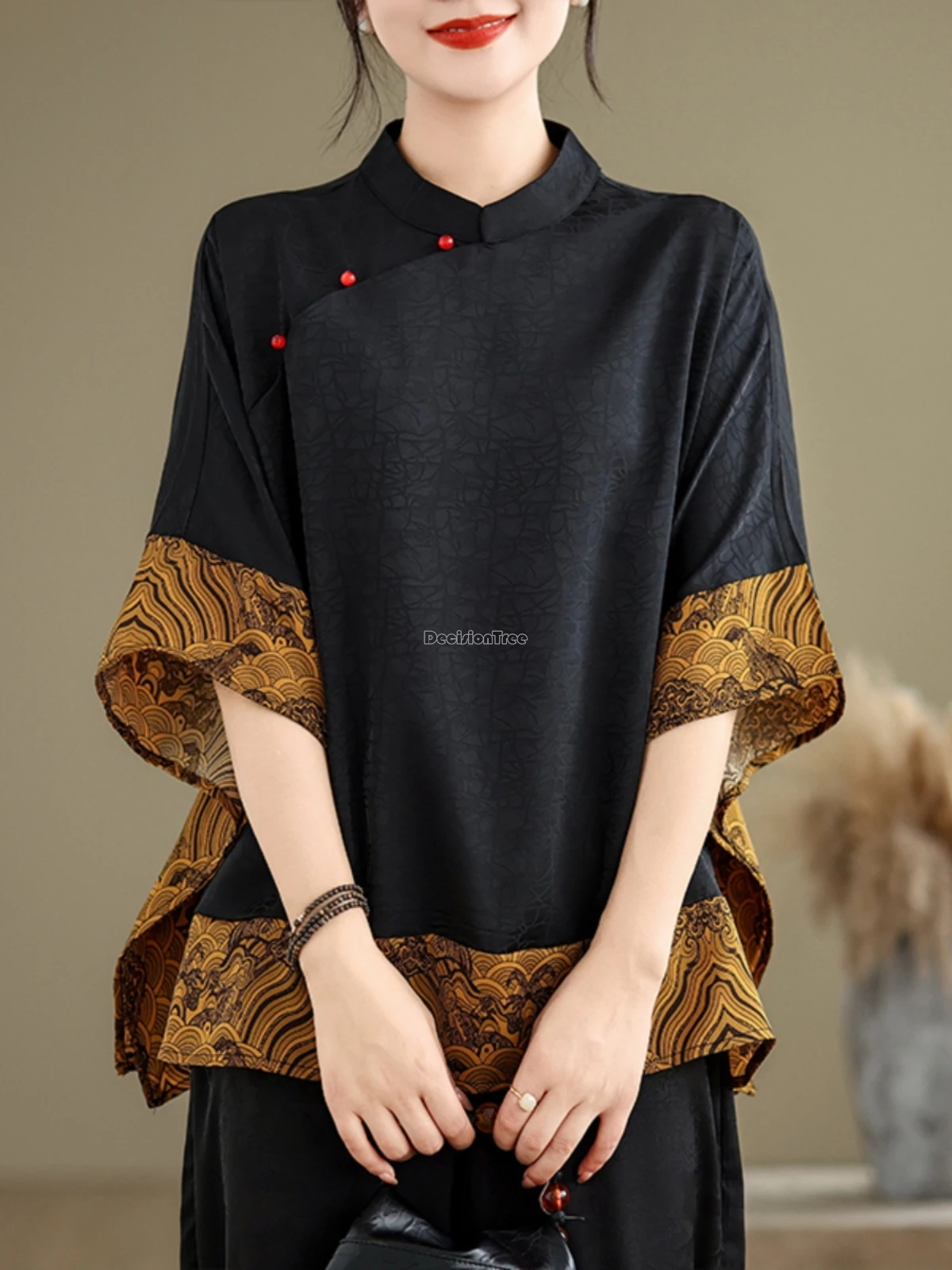 بلوزة تانغ بأكمام نصف كم على الطراز الوطني الصيني القديم لعام 2025 بلوزة نسائية صيفية فضفاضة على الموضة من شيونغسام t001