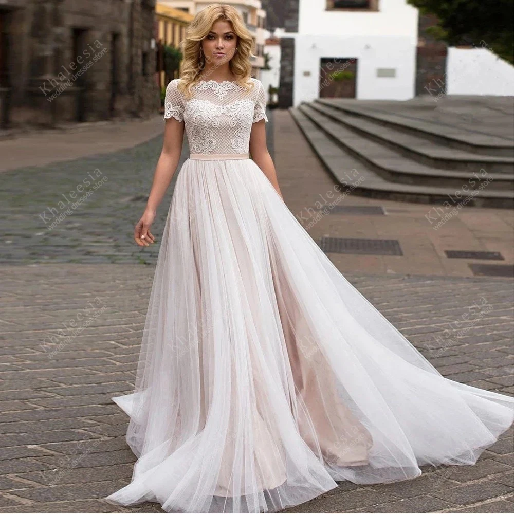 

Изящные свадебные платья A Line Свадебные платья A Line Тюль Многоярусные свадебные платья Кружевные аппликации Vestidos De Novia по индивидуальному заказу 2025