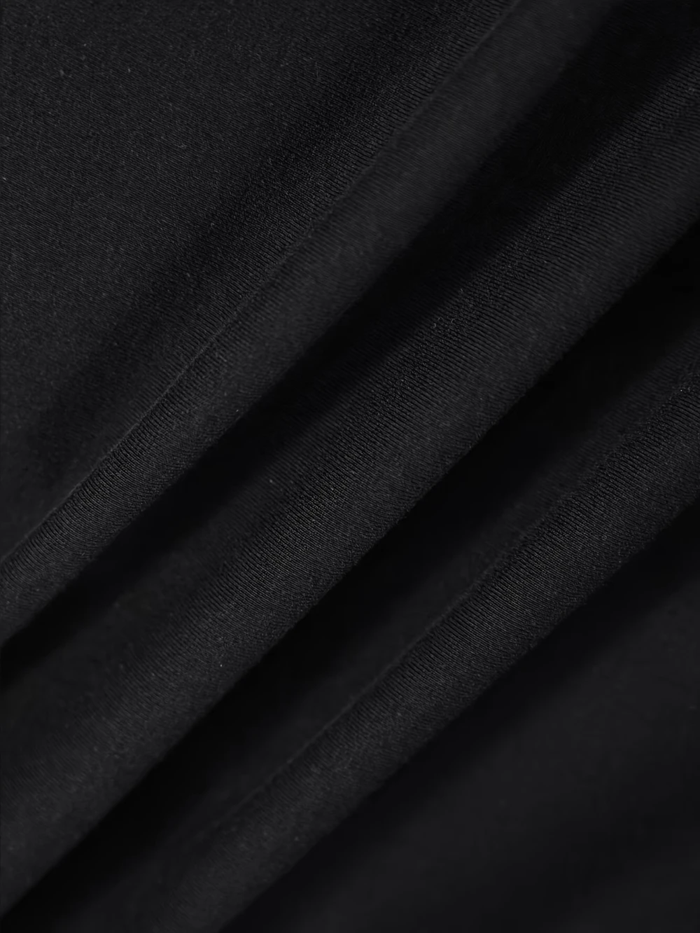 The black T-shirt features a red and white Cybernet system graphic with a triangular design and the word 