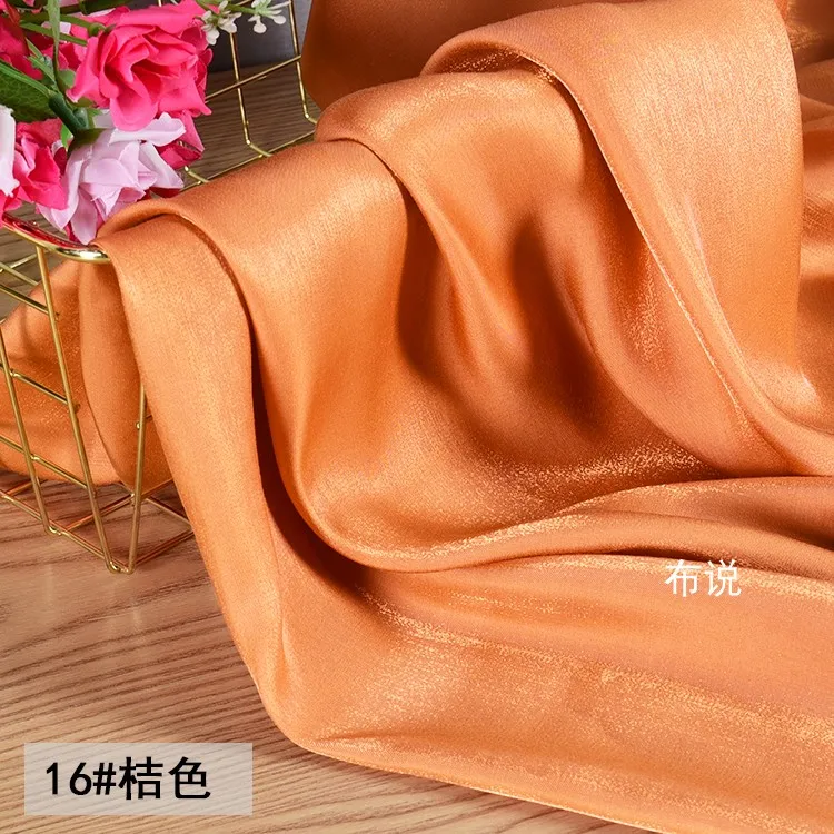 Arancione lucido Lucite Illusion tessuto camicia di raso colorato cristallo sirena Ji Laser Hanfu tessuti di seta oro e argento