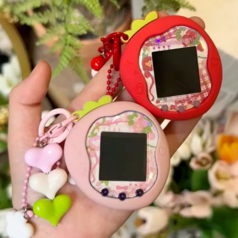 

New Tamagotchi Uni Electronic Pet With Silicone Protective Cover In Red Green Apple Strawberry Designs New Stock Toy