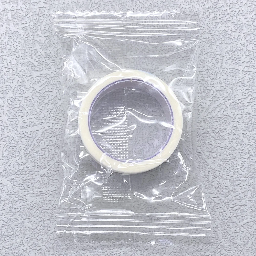 10/20/50 rollos de cinta para pestañas, venta al por mayor, 4,5 M, cinta de papel para extensión de pestañas, parches adhesivos de tela no tejida transpirable debajo de la almohadilla para los ojos