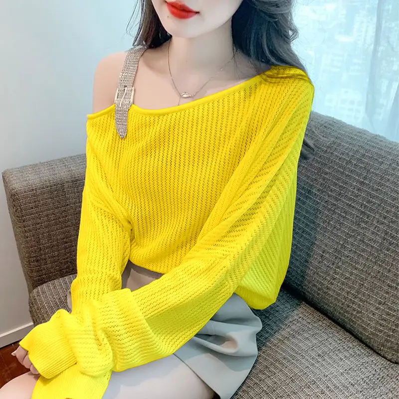 ソリッドカラー長袖ニットセータープルオーバー婦人服早春 2025 新しい中空アウト薄い日焼け止めトップ