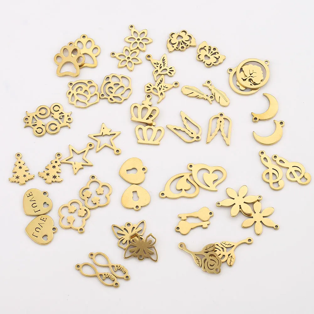 Breloques en acier inoxydable, 20 pièces/lot, mélange de bijoux exécutifs, couronne, plume, papillon, clé, petit cuir chevelu, connecteurs,