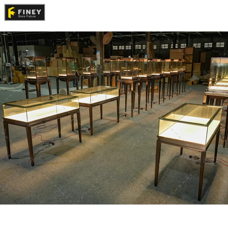 

Customize.Customized Showroom Interior Jewelry Display Cabinet Gold Metal LED Light Jewelry Counter Jewelry Showcase Display Vit