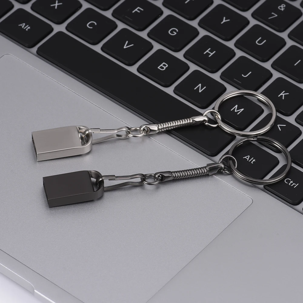 محرك فلاش USB صغير للغاية 64 جيجابايت سلسلة مفاتيح مجانية محرك القلم 32 جيجابايت عصا ذاكرة معدنية سوداء فضية بندريف Gufts الأعمال الإبداعية