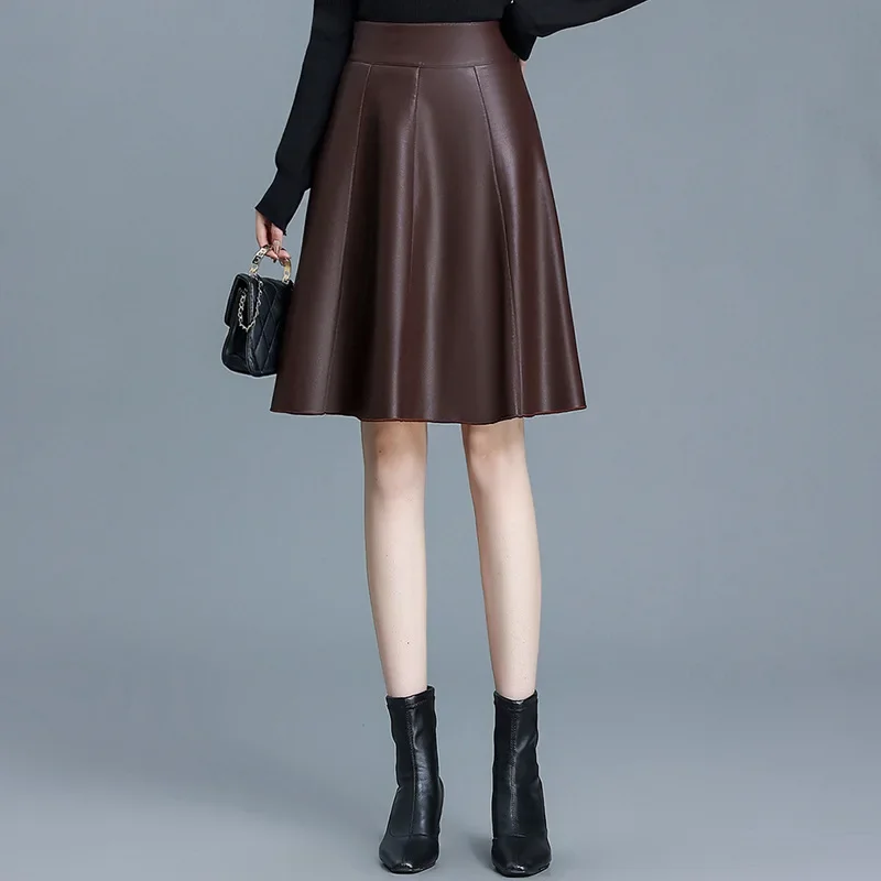 خريف شتاء بولي Leather تنورة جلدية صغيرة ألف خط ميدي تنورة عصرية متعددة الاستخدامات قصيرة عالية الخصر التخسيس مطوي التنانير