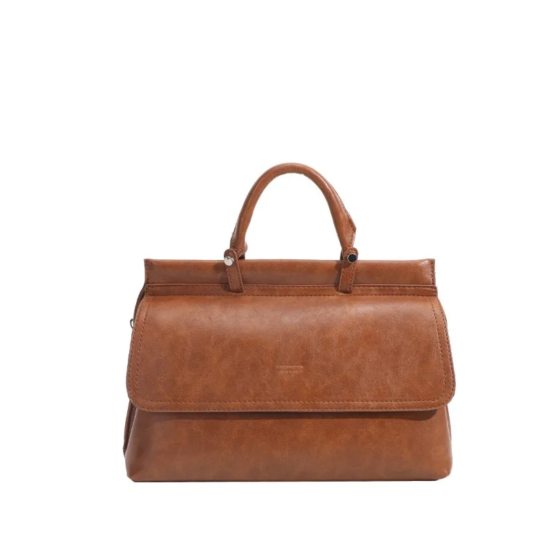 

Винтажный дизайн 2026: Новая женская сумка-тоут большой вместимости для работы и повседневного использования, однотонная, из искусственной кожи, деловая женская сумка