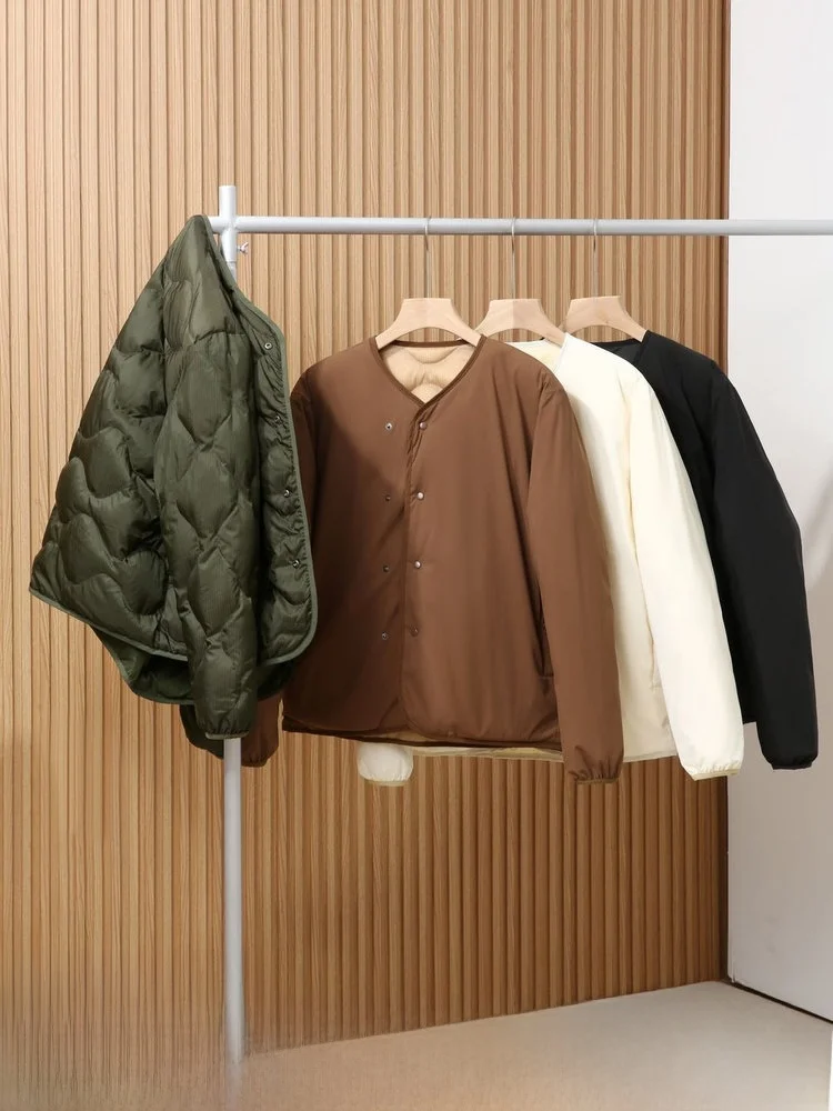 

Casual Loose Double-Sided Wear White Du down Padded Jaet Outdoor Leisure Faion Stitching Polyester Fiber round Ne But...