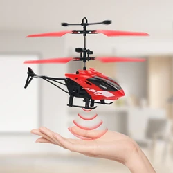 Remote controlled aircraft with lights can sense flight, withstand impact, and play. Suspended helicopter mini