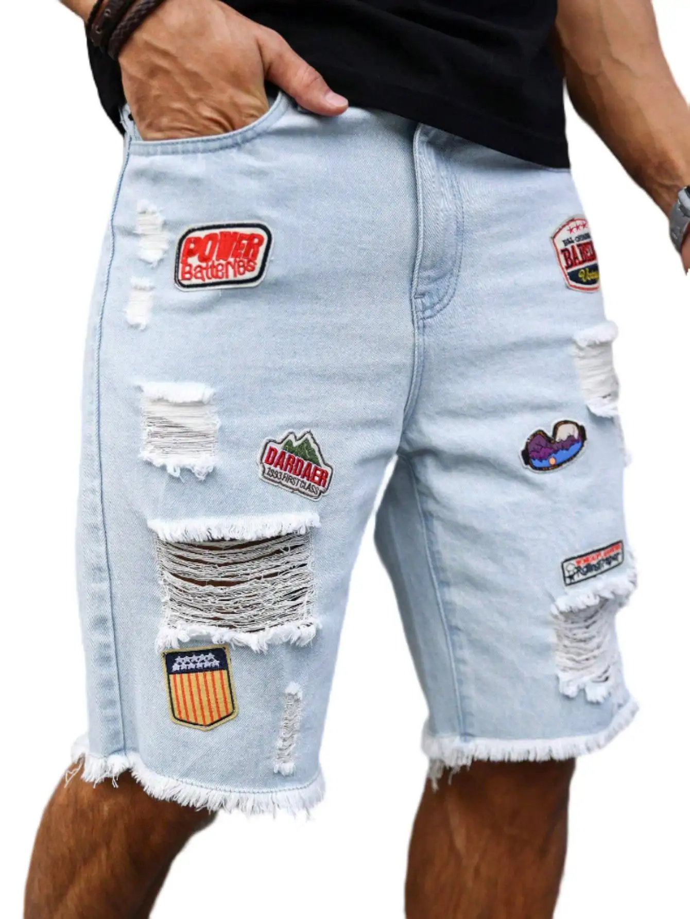 Men's light blue ripped denim shorts with patches for summer. Frayed edge design, showcasing street - style and a casual vibe.