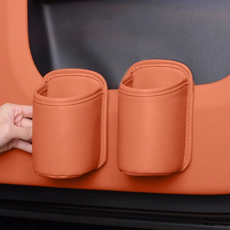 Portavasos Universal de cuero para puerta de coche, organizador de bebidas, estante para botellas de agua para asiento trasero, accesorio Interior para coche