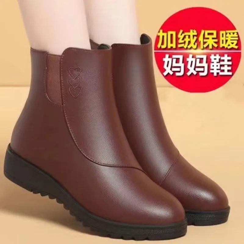 Plana com costura botas modernas dedo do pé redondo sapatos femininos de salto baixo à venda 2025 moda sólida zíper tornozelo botas femininas concisas