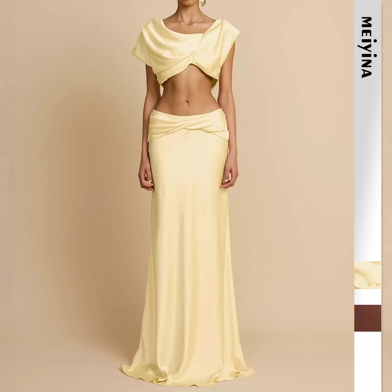 

Модный сексуальный женский комплект из двух предметов: асимметричный укороченный топ без рукавов и длинная юбка с плиссировкой и вставками, 2026