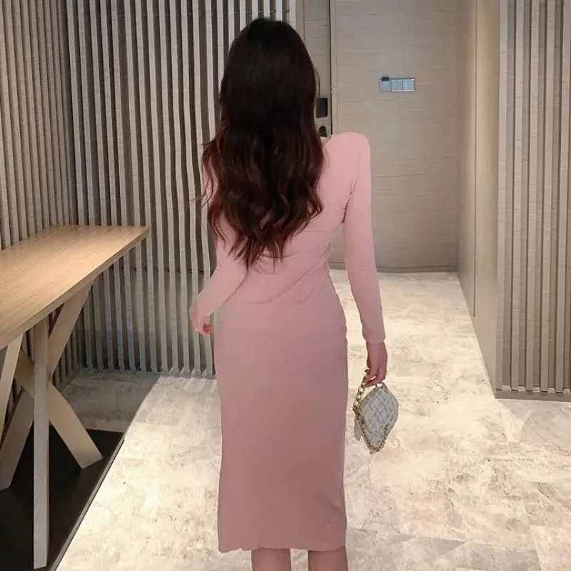 Abito aderente sui fianchi con scollo rotondo scavato e taglio basso per le donne Gonna lunga temperamento slim fit ragazza piccante autunnale