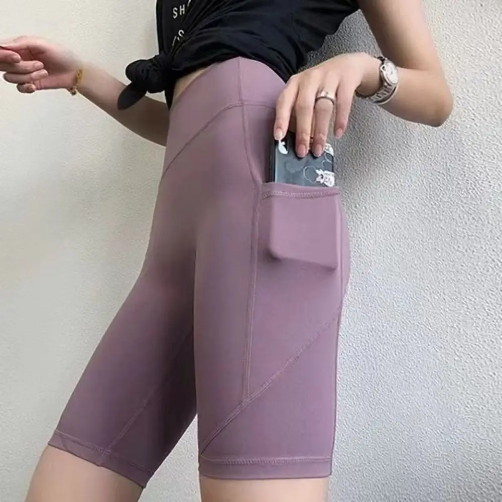 

High Waist Yoga Shorts Stretch Fabric Breathable Skinny Leggings Seamless Design Solid Color Sports Shorts Running Outdoors