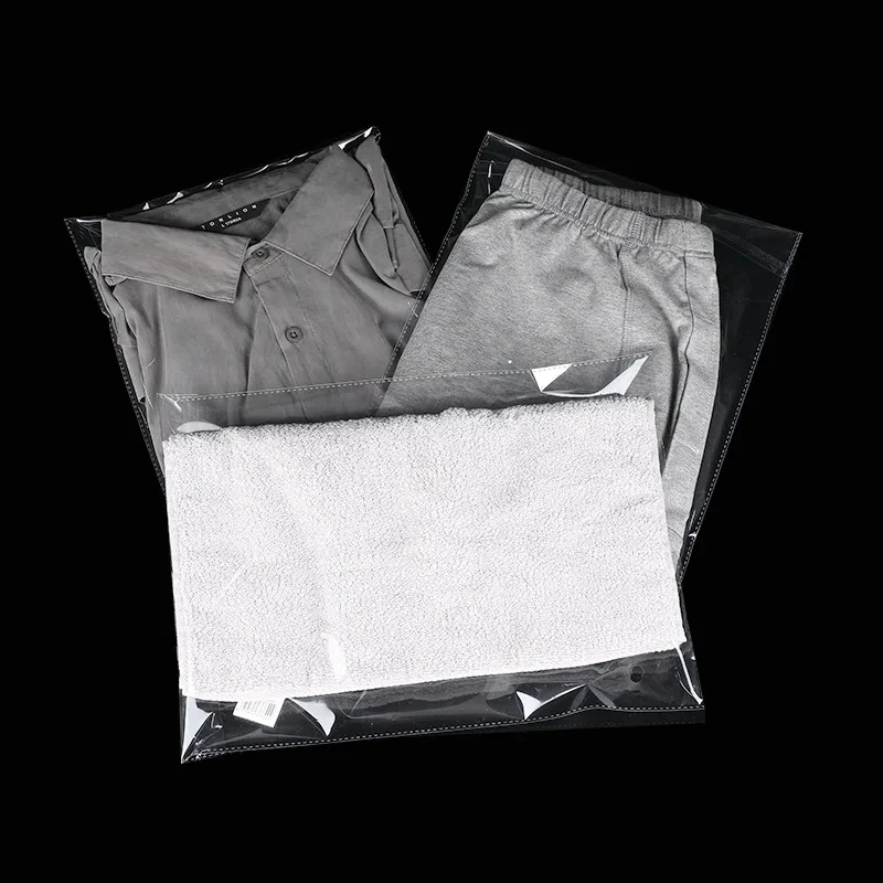 StoBag 100 Pieces Clear Apparel Bags Self Seal Plastic Bags Wedding Party Opp Gift Bag Adhesive Bags for T-Shirt and Clothes